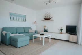 Nieuw appartement nabij het strand met privégarage